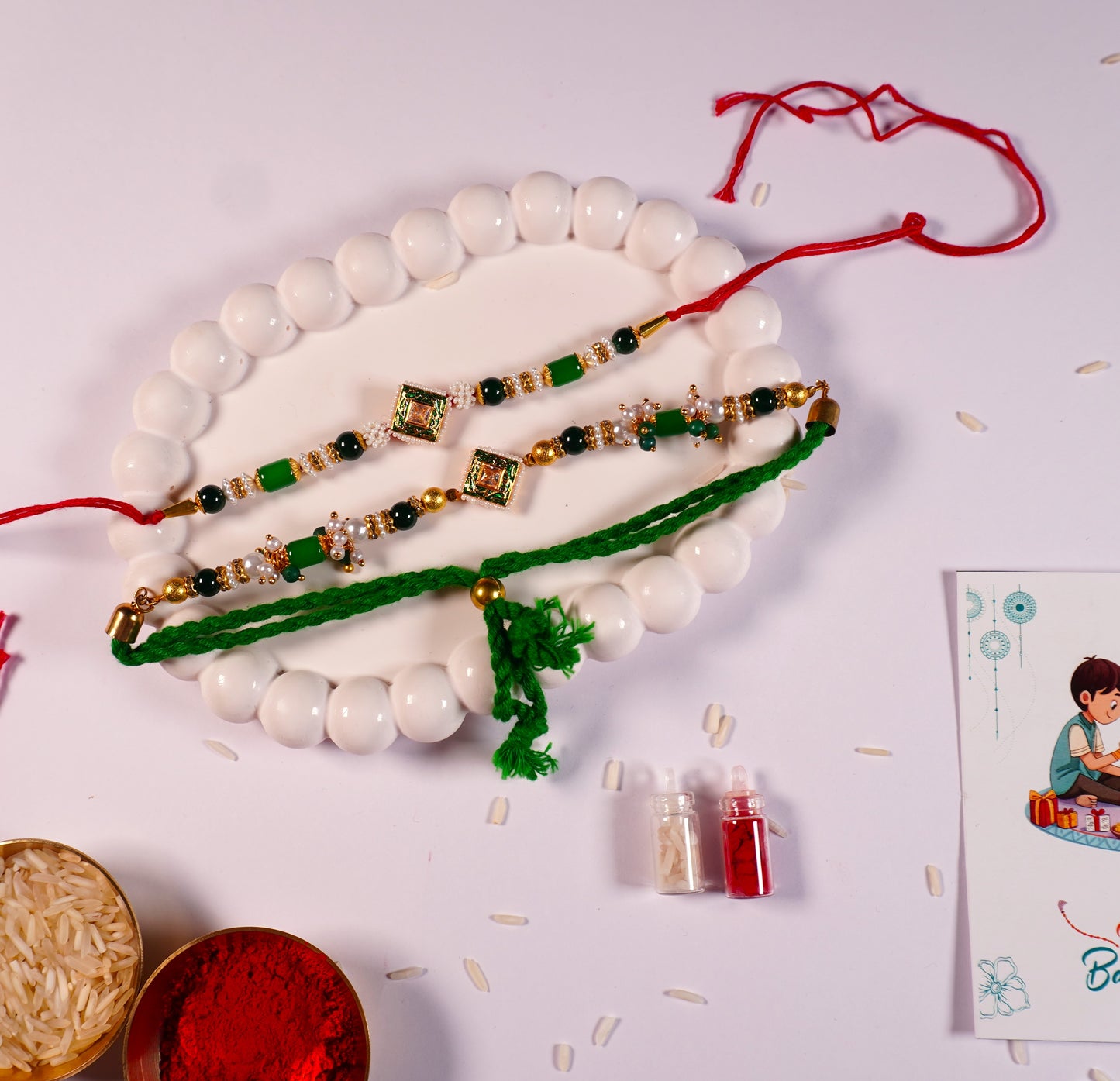Regal Emerald Kundan Bhaiya-Bhabhi Rakhi Set