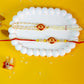 Red Eye Shape Kundan Couple Rakhi
